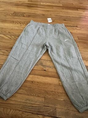Nike Light Gray Sweat pants with White Swoosh xl women’s